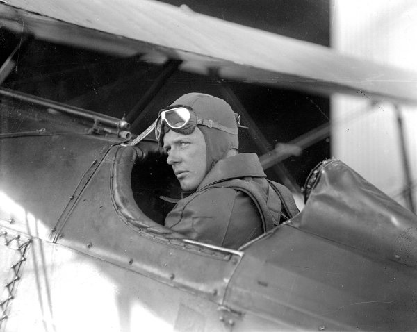 Charles Lindbergh in the cockpit of a plane.